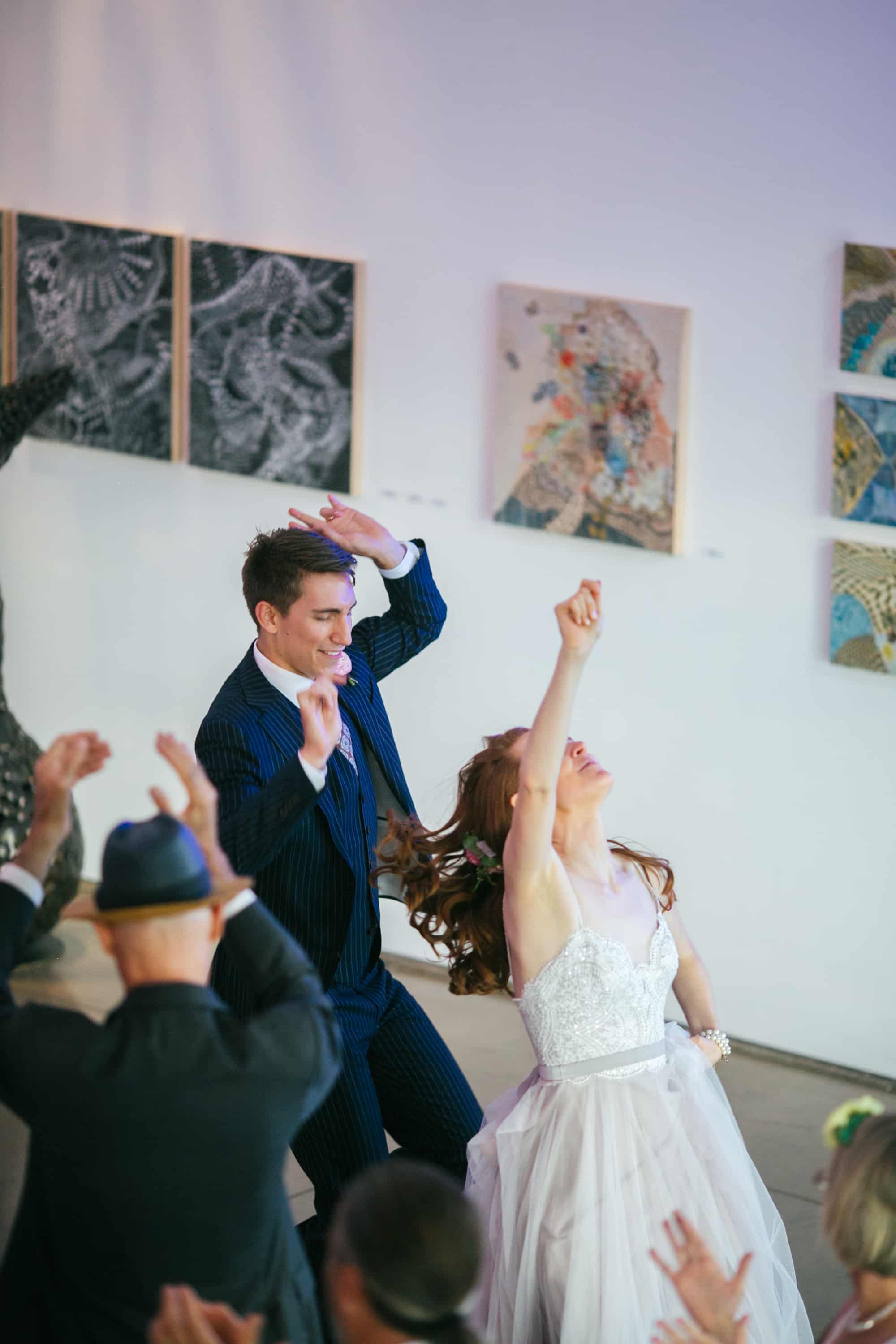 bride and groom being announced, bride and groom announced into reception, bride and groom announcement ideas, bride and groom dancing, fun bride and groom, silly bride and groom