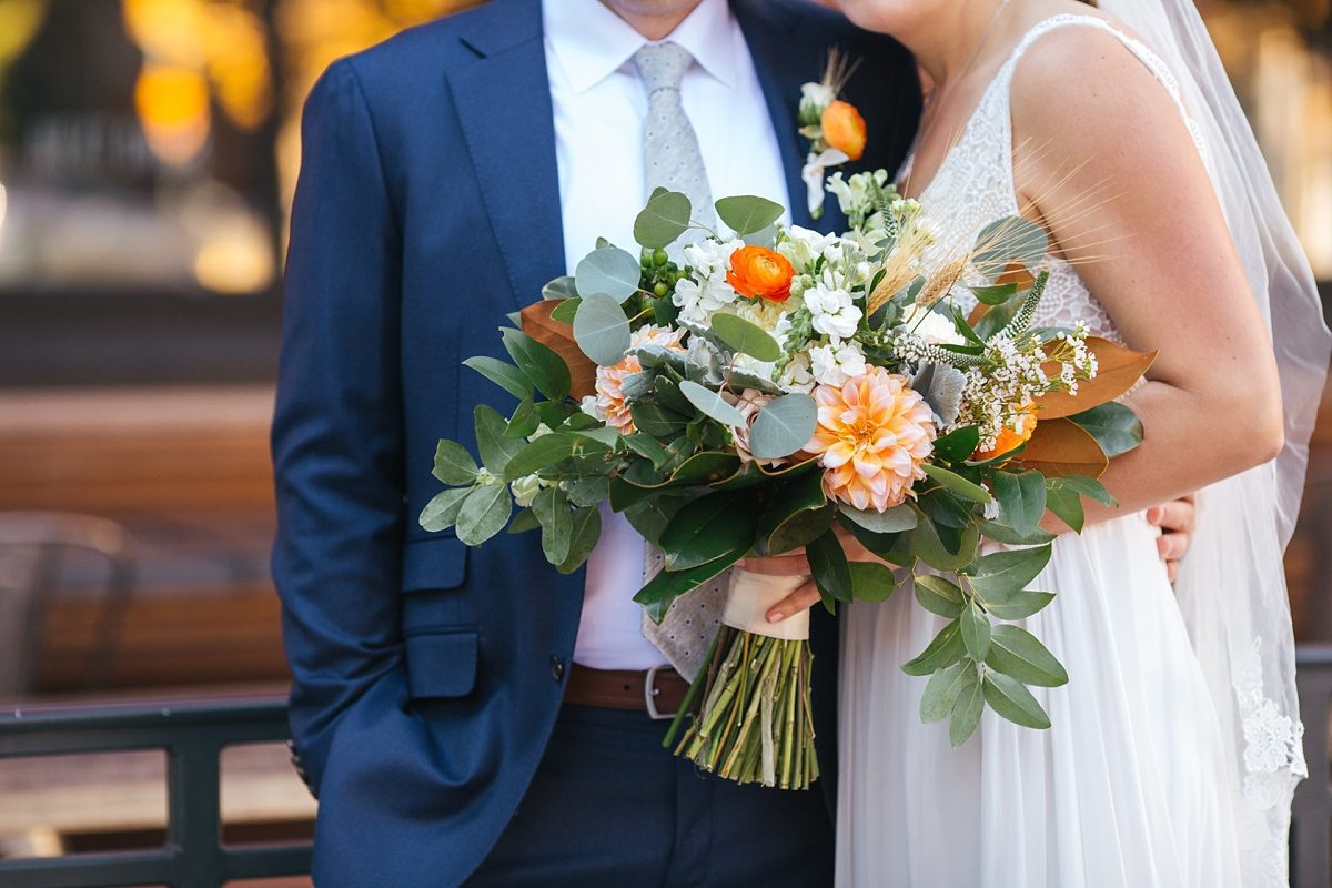 denver wedding, wedding bouquet, wedding flowers, wedding florals, orange wedding flowers, pops of orange wedding bouquet, bride and groom, wedding details, wedding inspiration