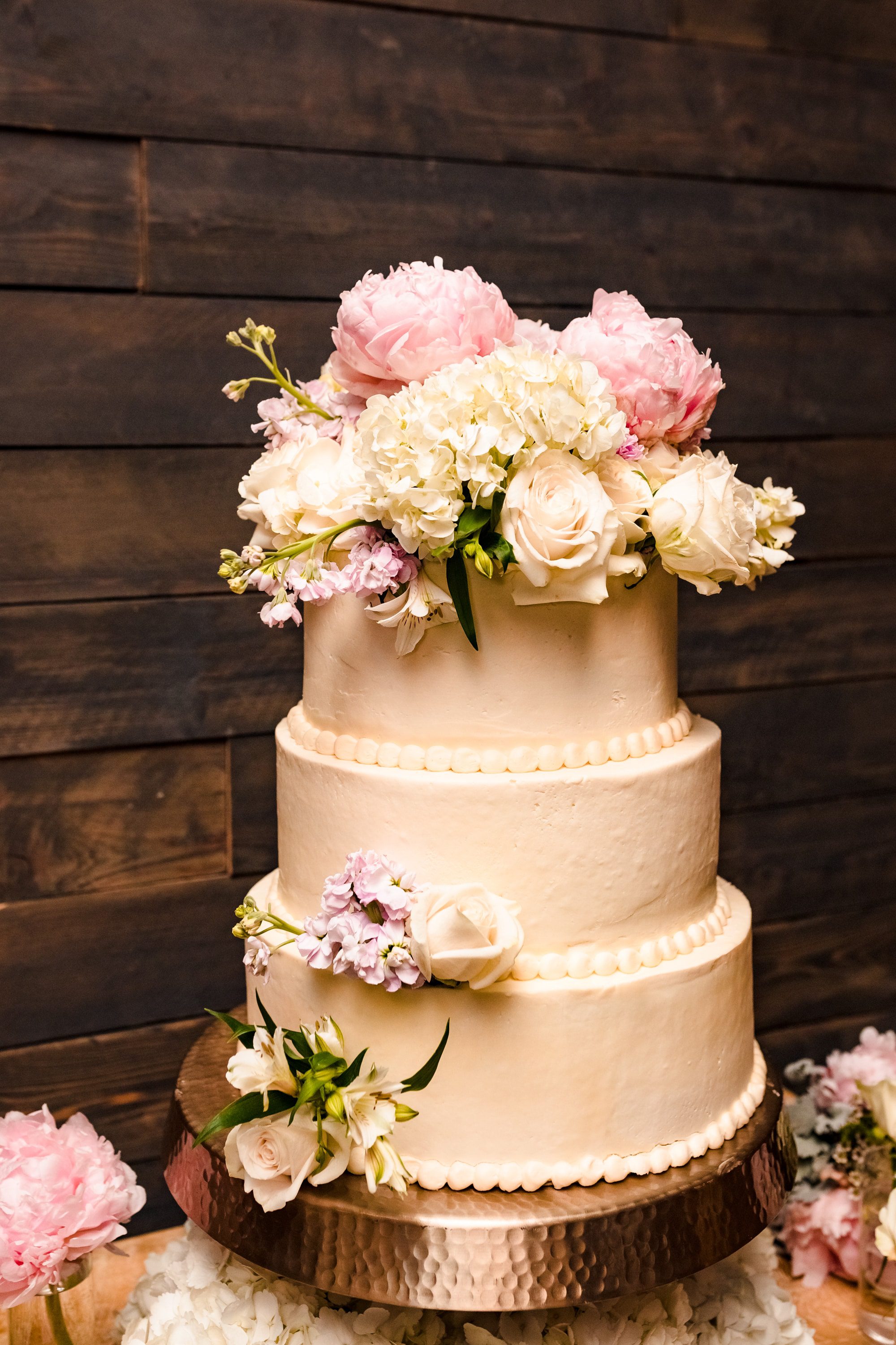 three tiered wedding cake, elegant wedding cake, wedding cake with flowers, simple wedding cake, white wedding cake with flowers, white and pink wedding cake