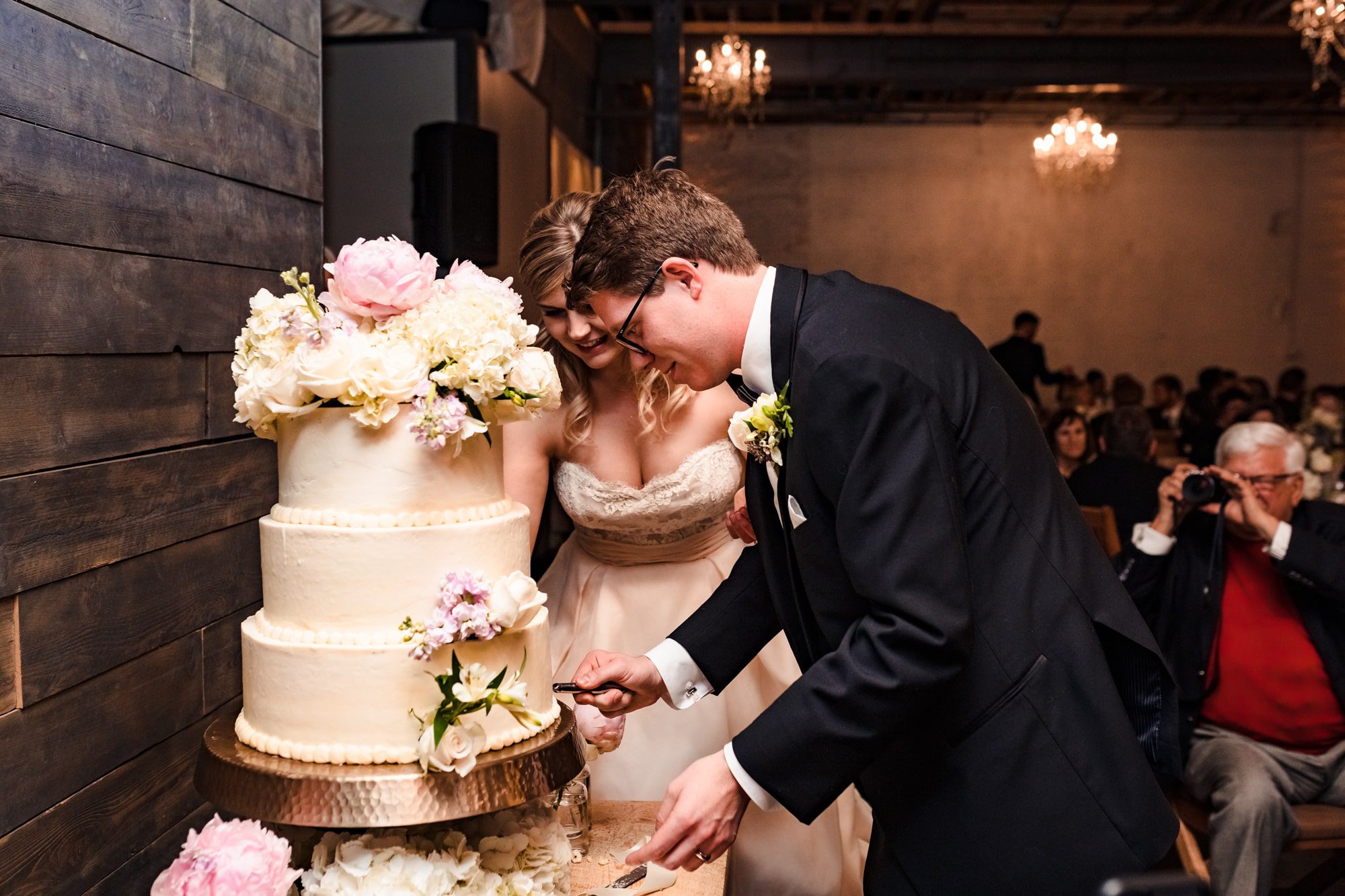 three tiered wedding cake, elegant wedding cake, wedding cake with flowers, simple wedding cake, white wedding cake with flowers, white and pink wedding cake, bride and groom cutting cake