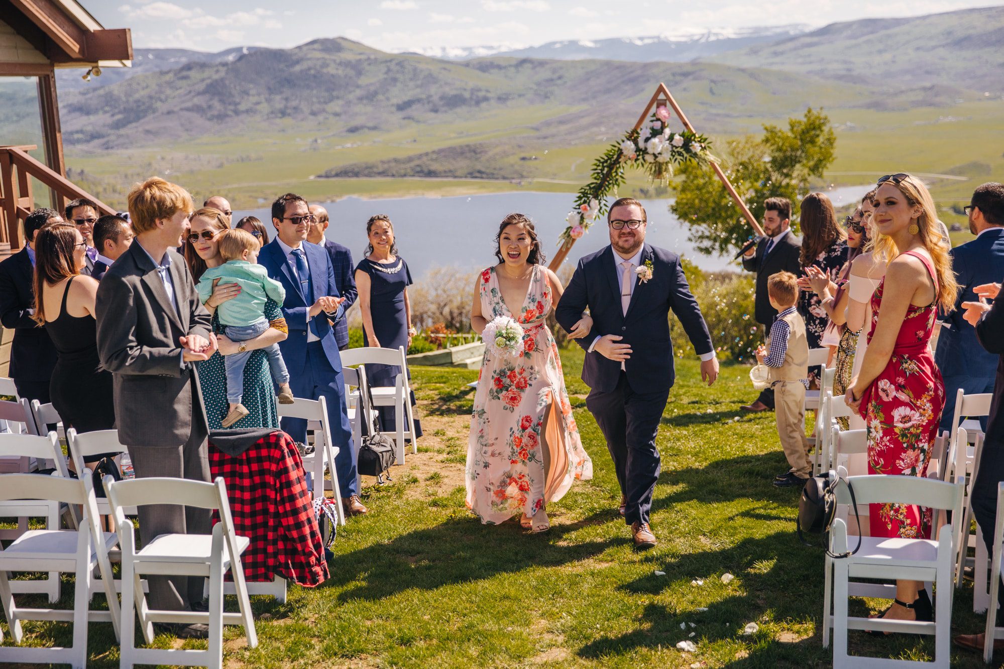 bella vista estates, bella vista wedding, bella vista estates wedding, steamboat springs wedding, colorado wedding, colorado, colorado wedding photographer, wedding ceremony, outside wedding ceremony, triangle wedding arch, geometric wedding arch