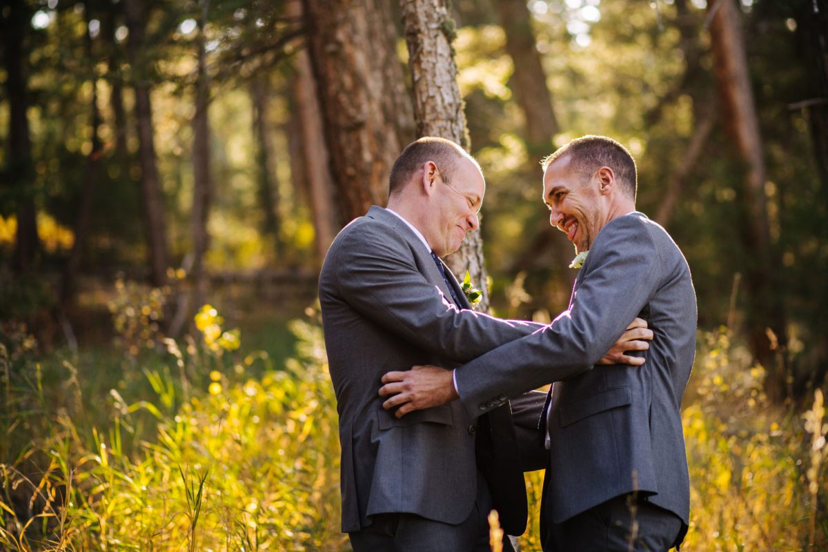 the pines at Genesee, the pines at Genesee venue, lgbt, two grooms, lgbtq, lgbt photographer, denver lgbt photographer, denver photographer, best photographers in denver, lgbt engagement photographer, denver lgbt engagement photographer, lgbt vendors, denver gay marriage, first look, two grooms smiling