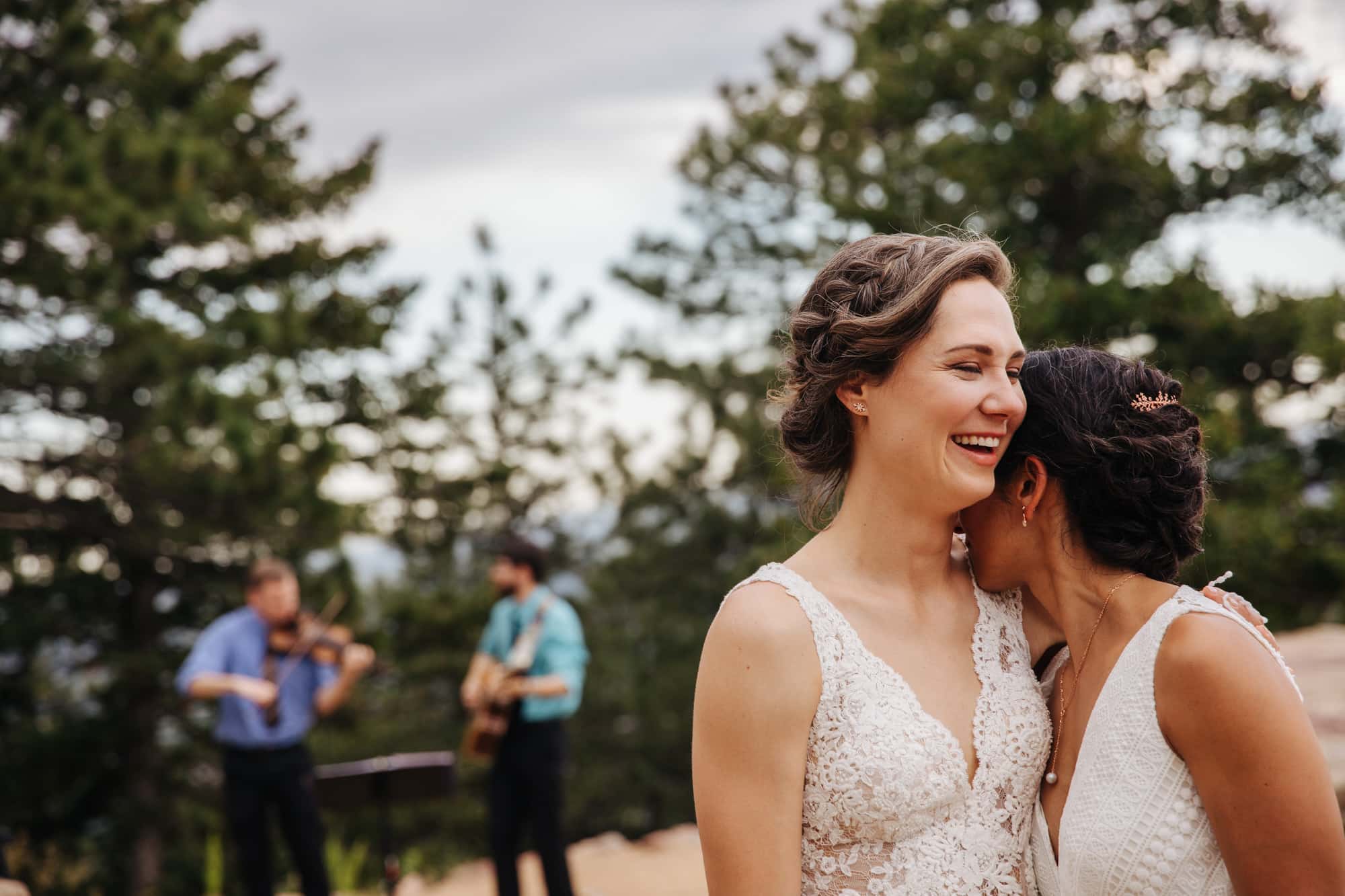 wedding photojournalism, wedding moment, two brides, brides laughing