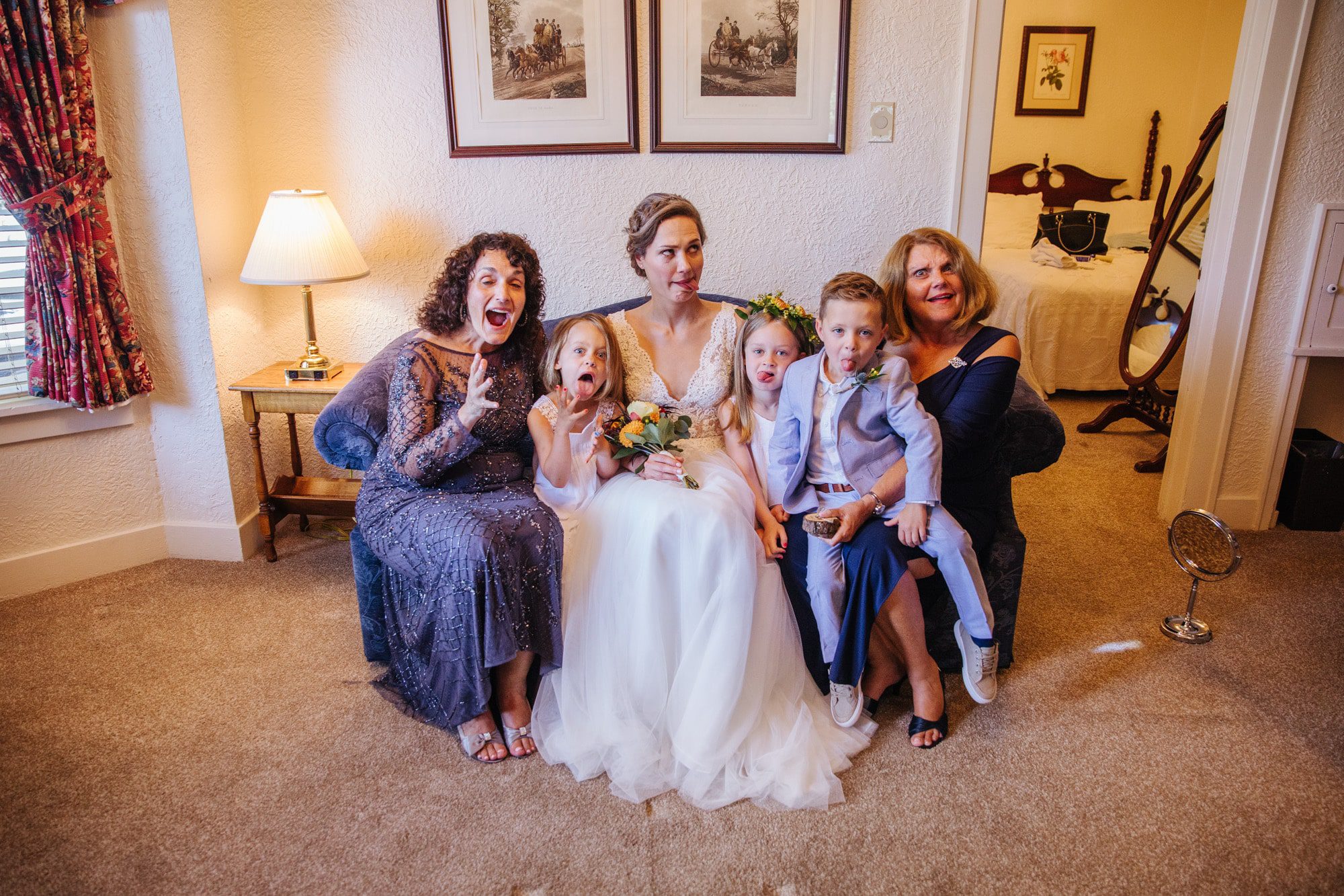 bride with family, bride with kids, silly face bride wedding
