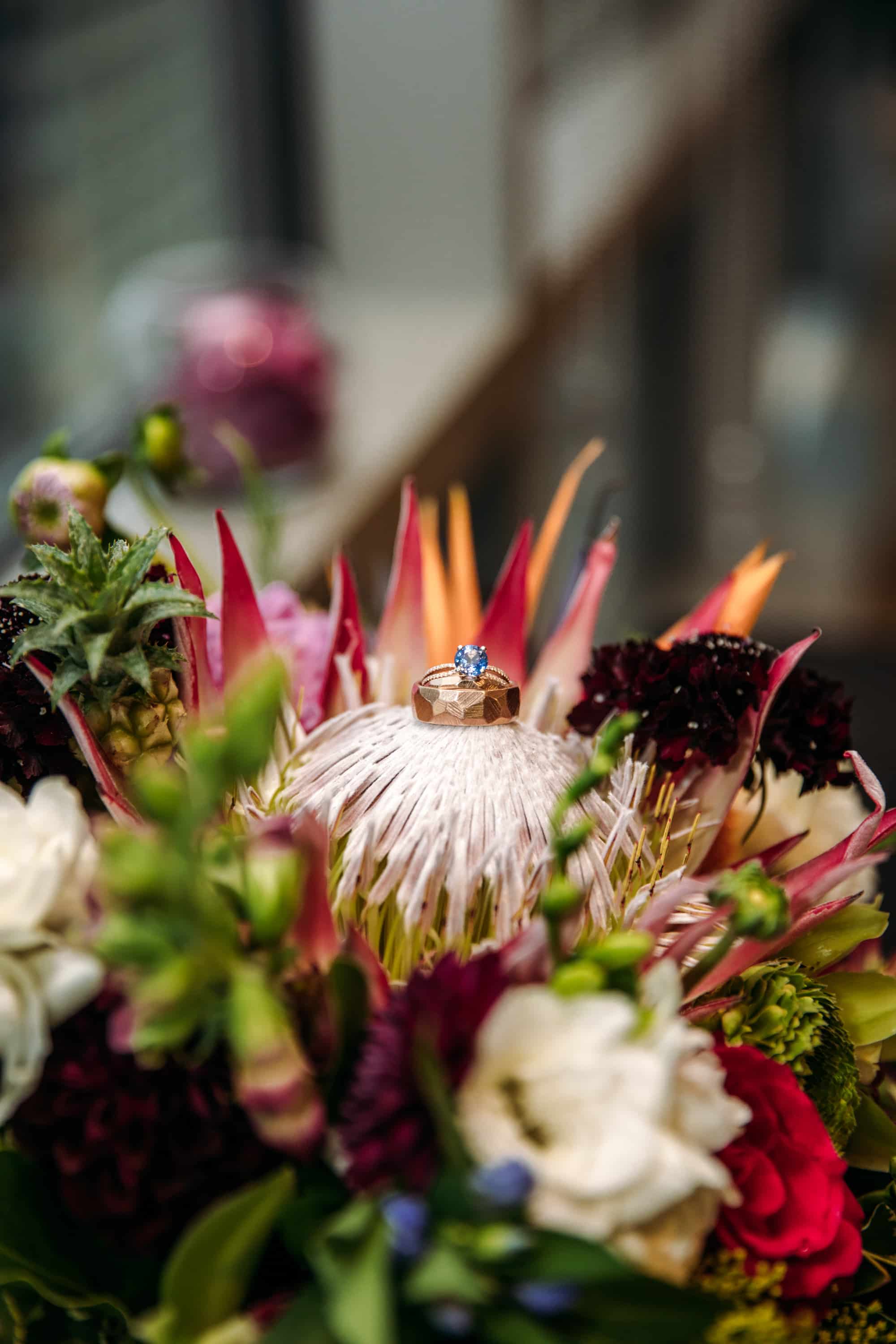 wedding details, colorful wedding flowers, tropical wedding flowers, tropical bridal bouquet, aquamarine engagement ring, blue wedding ring, blue diamond wedding ring