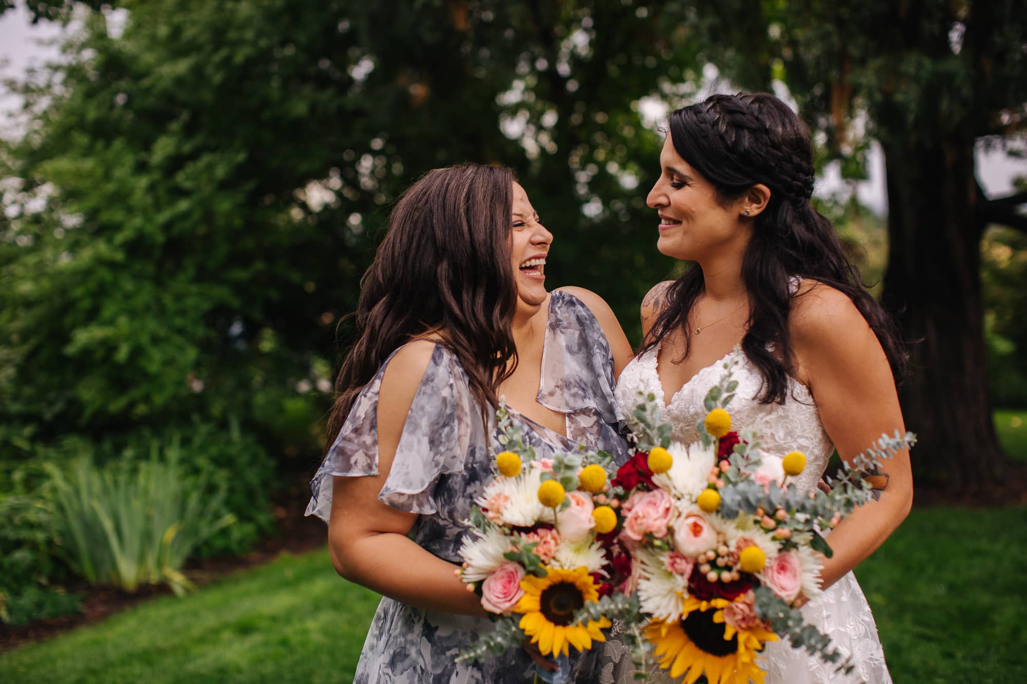 bride and bridesmaid, bride and maid of honor, grey bridesmaid dresses, floral bridesmaid dresses, unique bridesmaid gowns