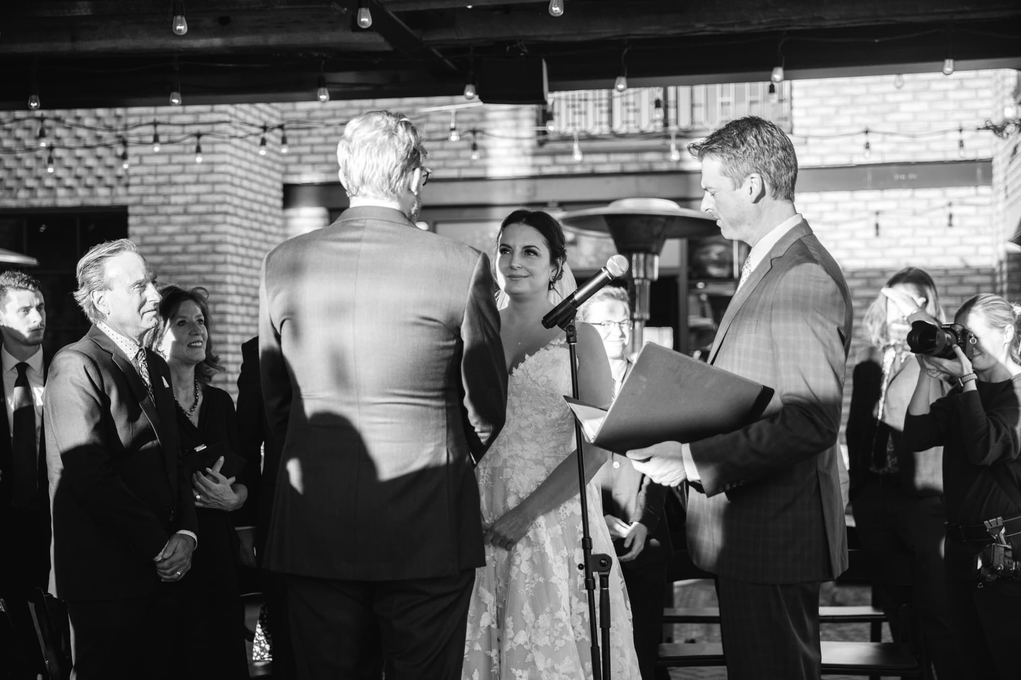 bride and groom, black and white wedding photographer, black and white wedding, wedding ceremony, black and white wedding ceremony, denver wedding photographer