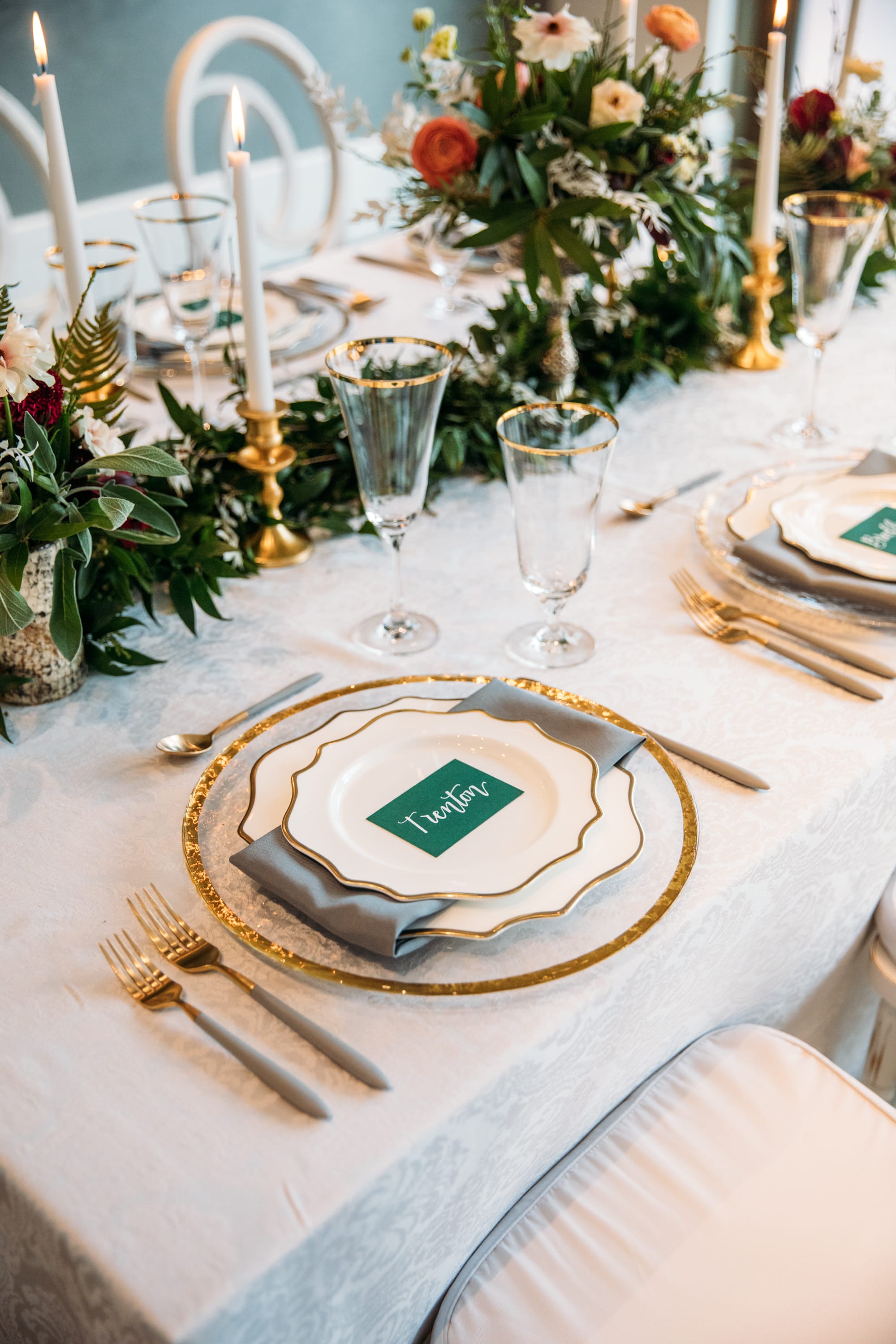 emerald wedding, wedding color inspiration, emerald and gold wedding, emerald and mustard wedding colors, gold silverware, elegant wedding tablescape, emerald wedding name tags, emerald name cards for table, white and gold candles