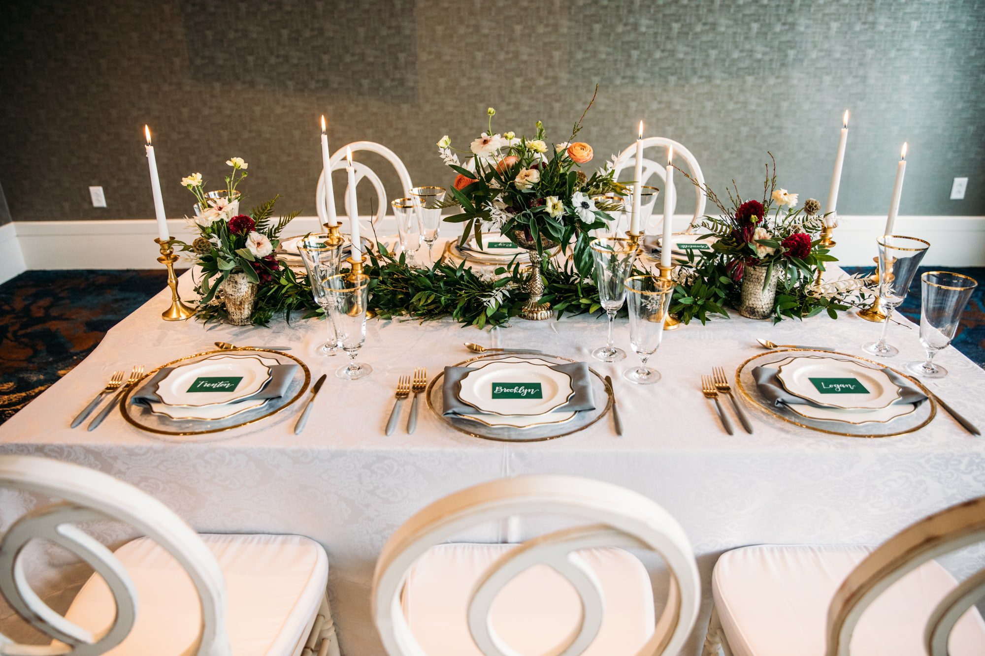 emerald wedding, wedding color inspiration, emerald and gold wedding, emerald and mustard wedding colors, gold silverware, elegant wedding tablescape, emerald wedding name tags, emerald name cards for table, white and gold candles