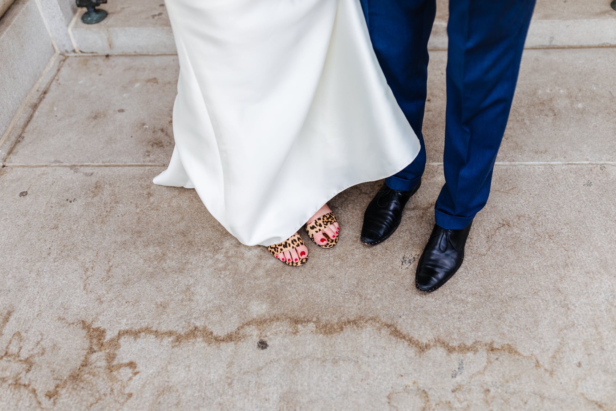 blue suit, wedding shoes, fun wedding shoes, cheetah heels wedding, fun wedding shoes for bride, blue suit, black mens shoes, black groom shoes
