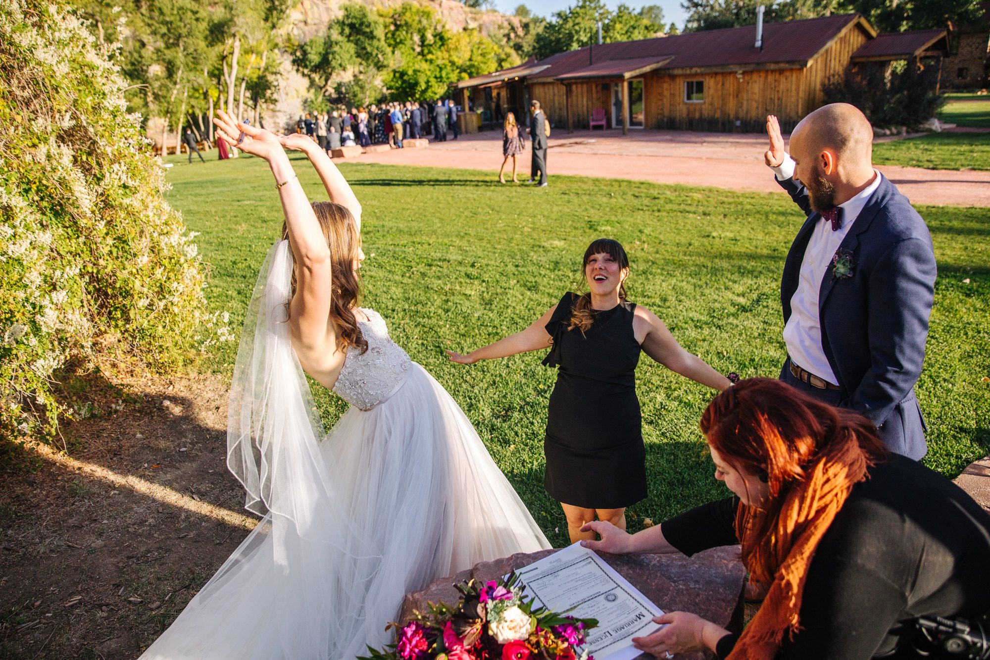 candid wedding photos, signing the marriage license, fun wedding photos