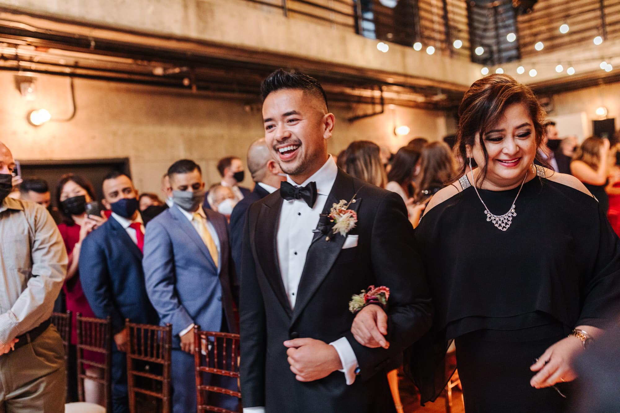 groom with mom, lgbt wedding with family, walking down aisle, walking down aisle with mom, lgbt wedding, fremont foundry wedding