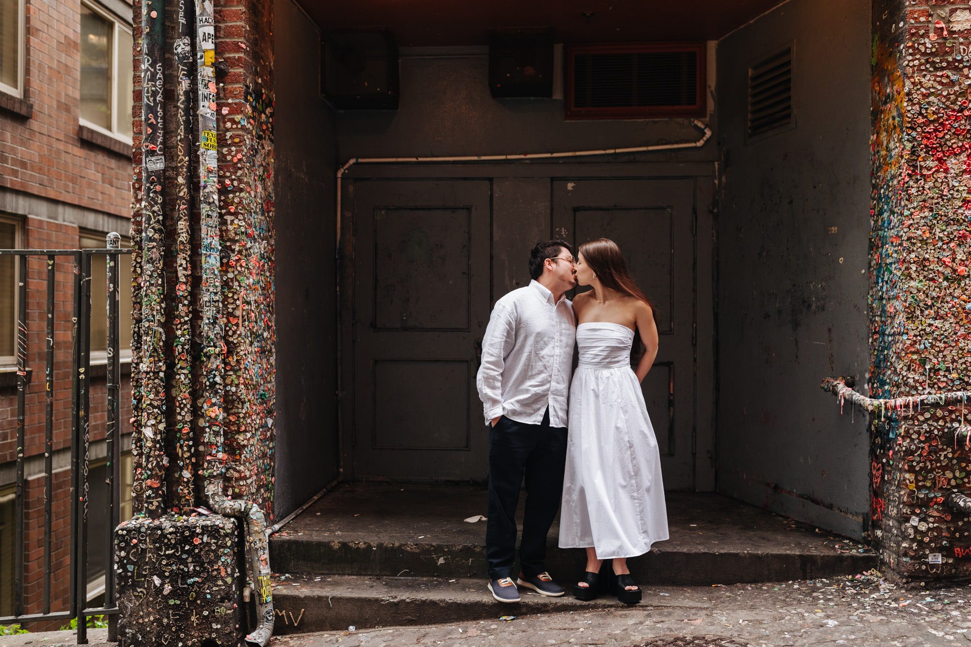 Seattle engagements, downtown Seattle engagements, gum wall seattle, gum wall engagement photos, seattle engagement photographer, seattle city engagements, urban seattle engagements, white outfits engagements, white engagement outfits