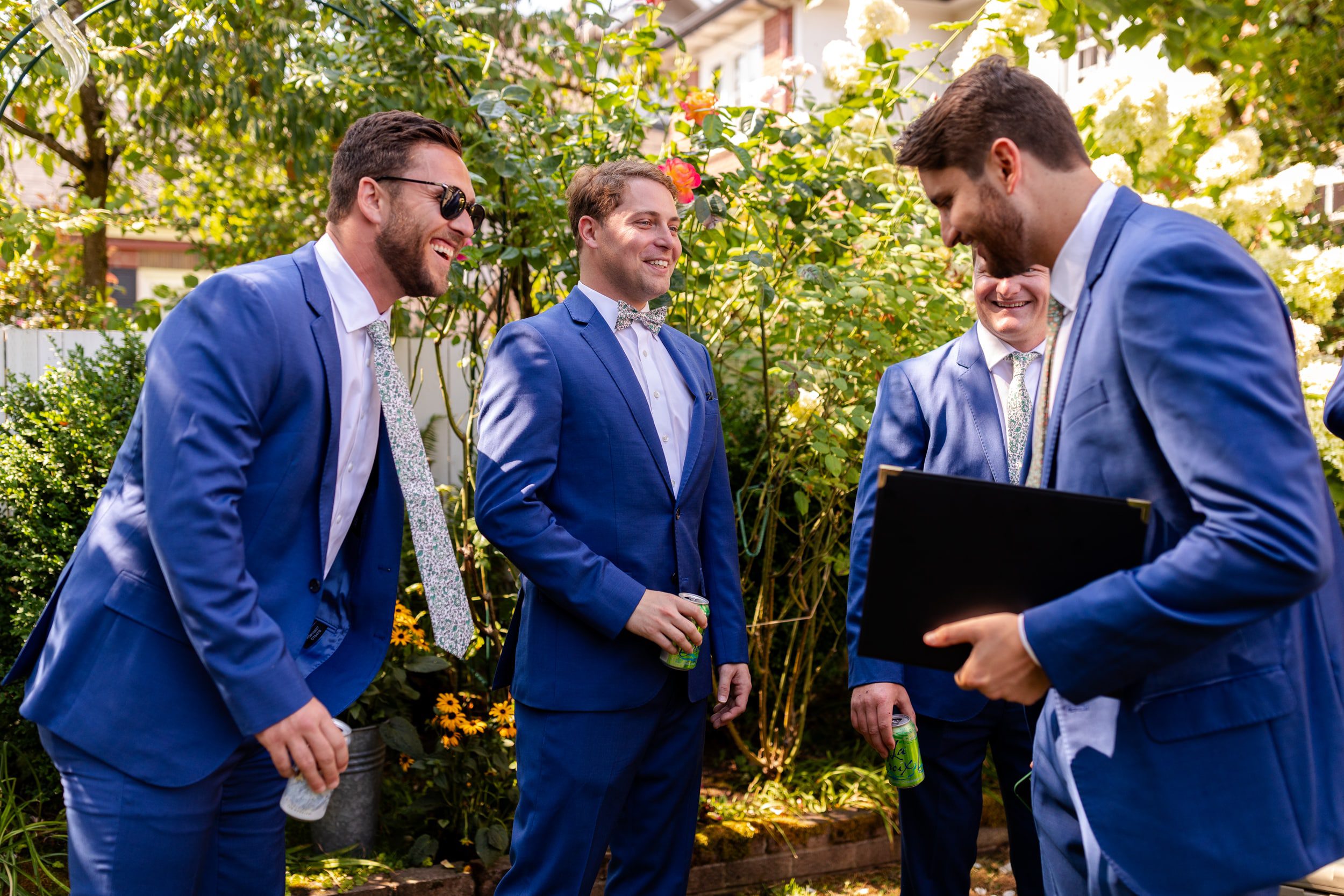 candid groomsmen photos, hanging out with groomsmen ahead of wedding, wedding getting ready, blue suit groomsmen
