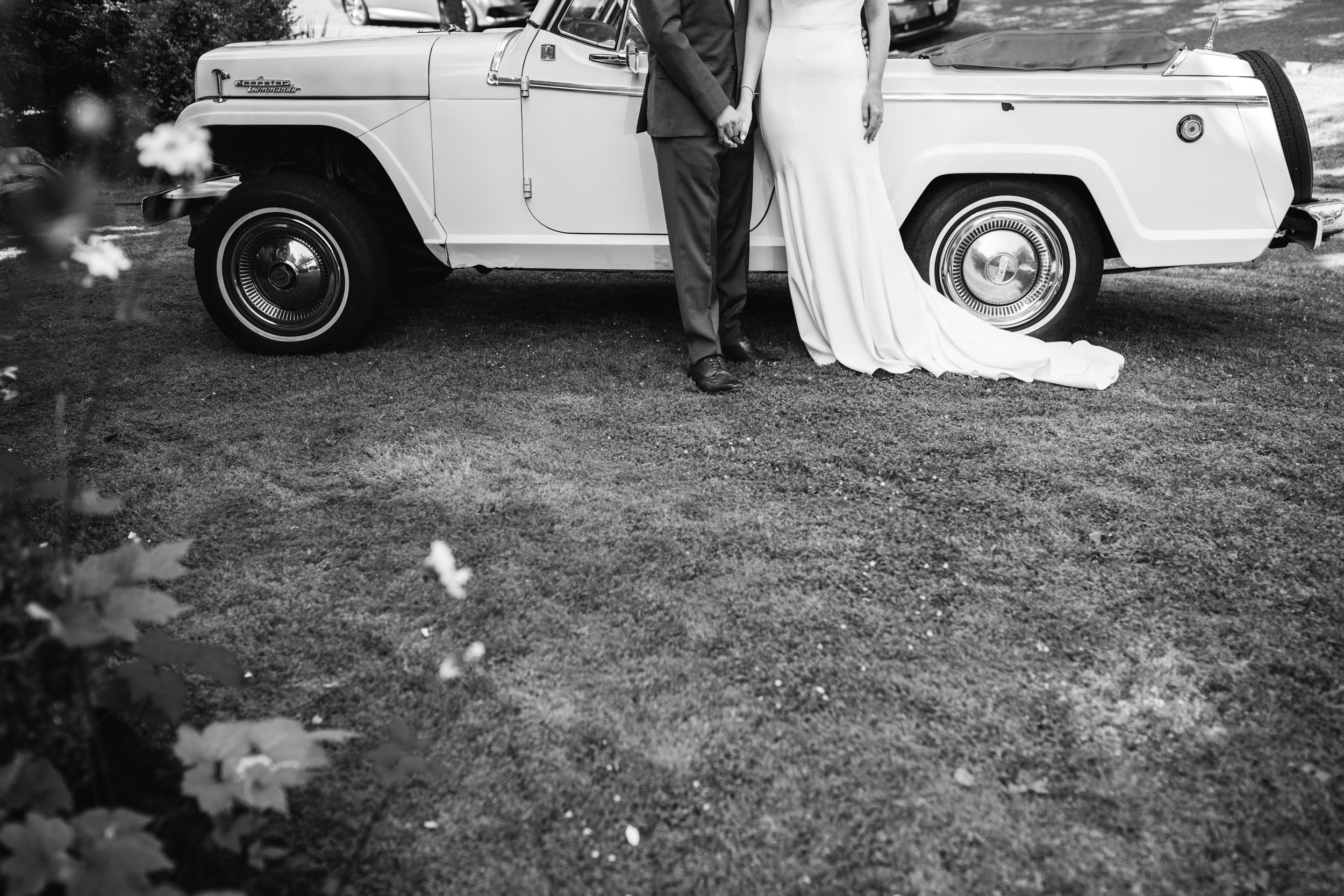 bride and groom with old car, black and white bride and groom, black and white wedding photos, old car wedding photos, get away car wedding