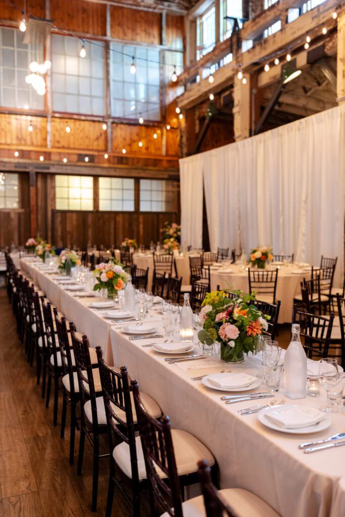 colorful wedding flowers, seattle elegant wedding flowers, seattle elegant colorful tablescape, sodo park wedding, sodo park seattle wedding, sodo park wedding reception, seattle wedding tablescape, white tablecloth with colorful bouquets, wedding table decor seattle