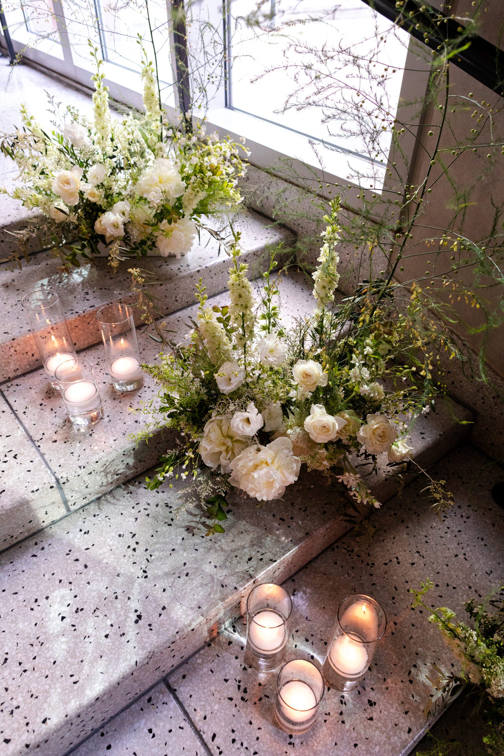 Downtown Seattle wedding at the Seattle Art Museum complete with candles, elegant florals and a black tie wedding.