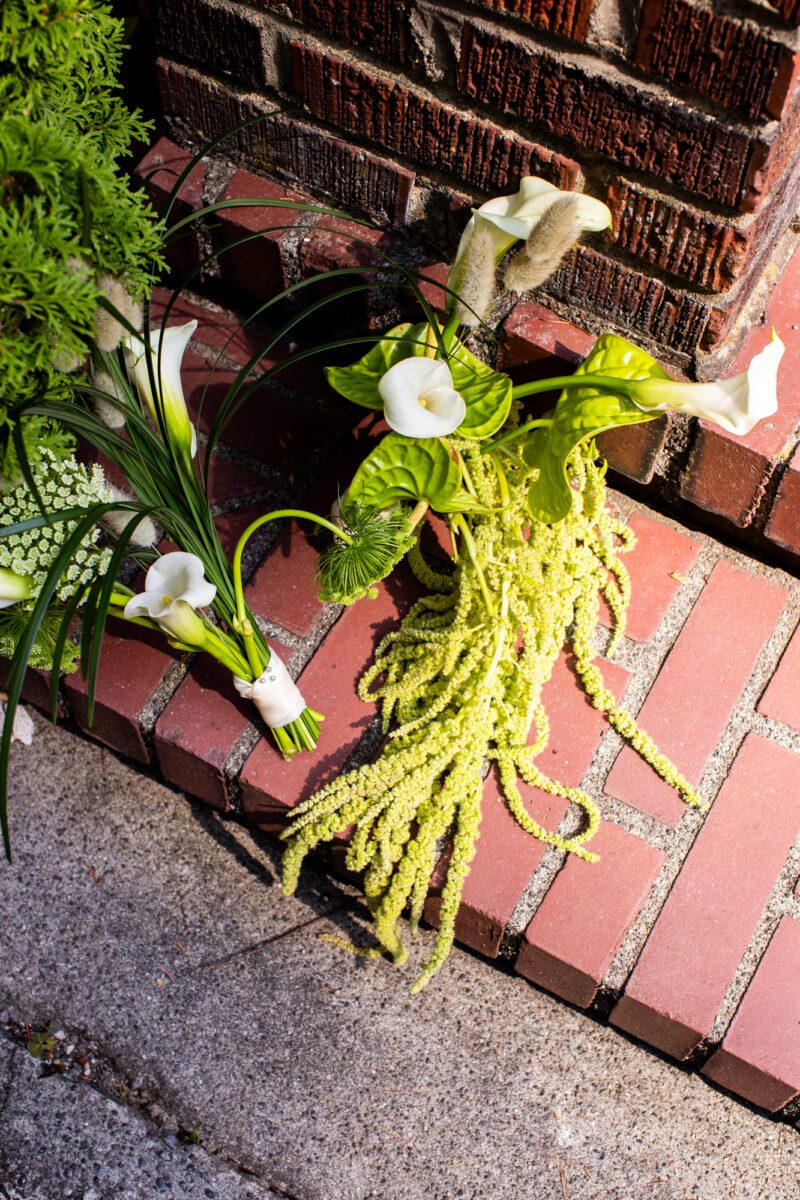 Close up photo of white and green wedding flowers at Villa Academy in Seattle