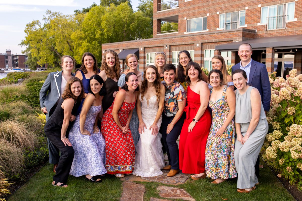 College group photo during Wood, Mark hotel wedding near Seattle