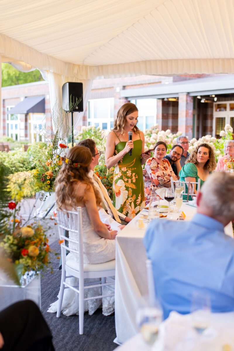 Sister of the bride, giving a toast during speeches