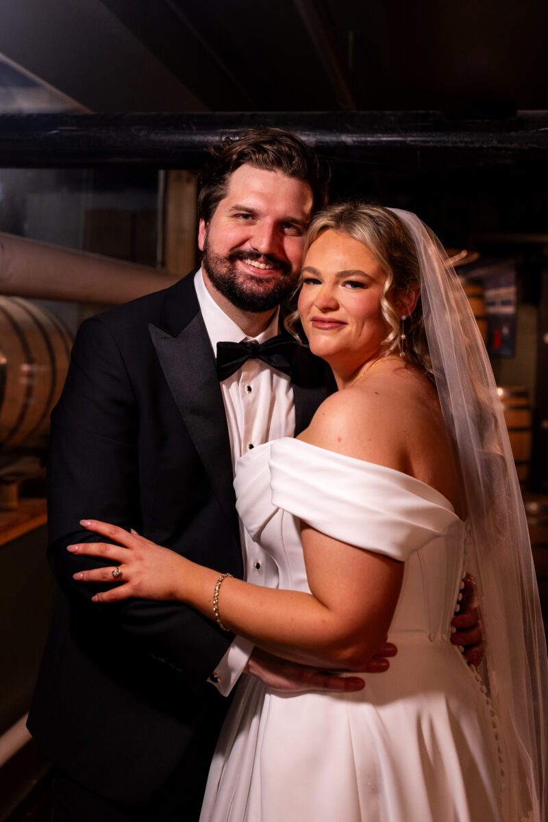 Romantic first look in wine cellar, chuckanut bay distillery wedding, wedding in bellingham washington