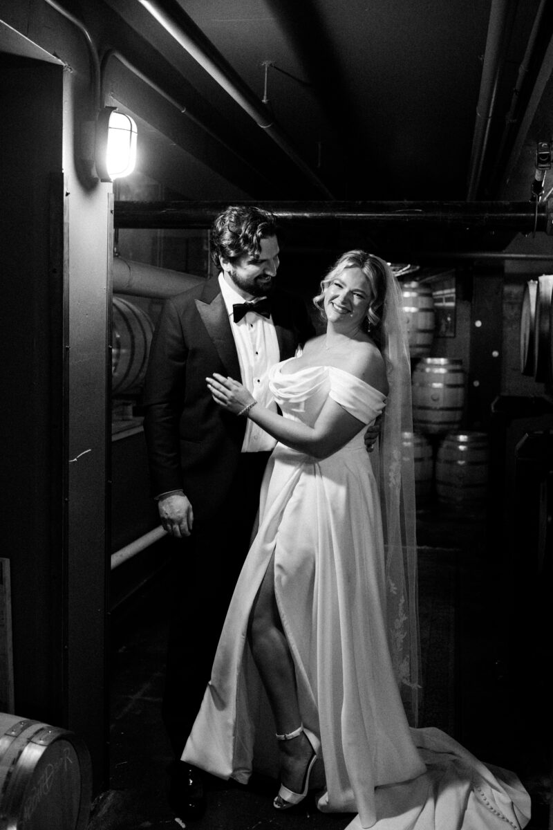 Romantic first look in wine cellar, chuckanut bay distillery wedding, wedding in bellingham washington