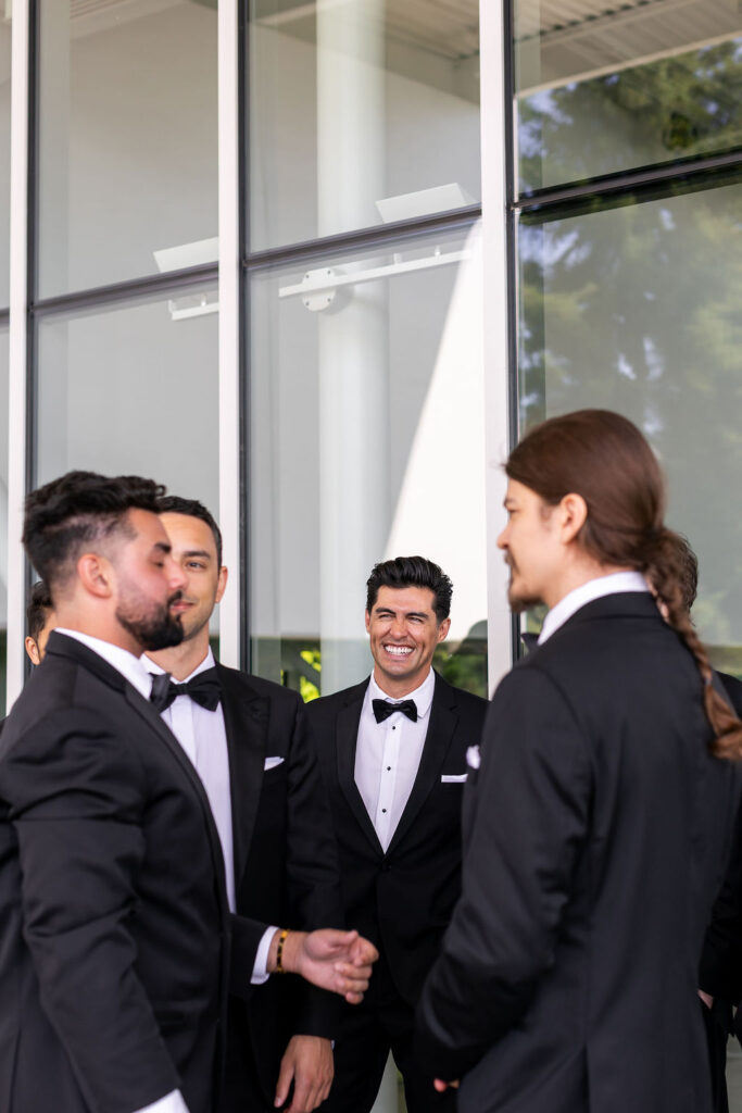 grooms with groomsman