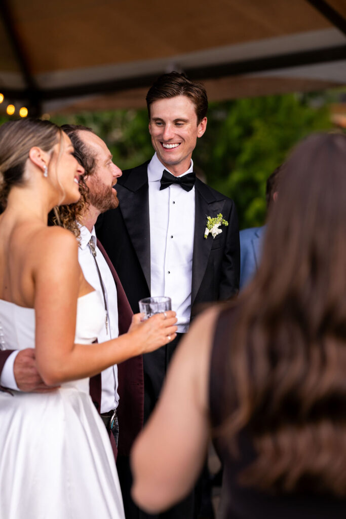 guests enjoy cocktail hour at wedding