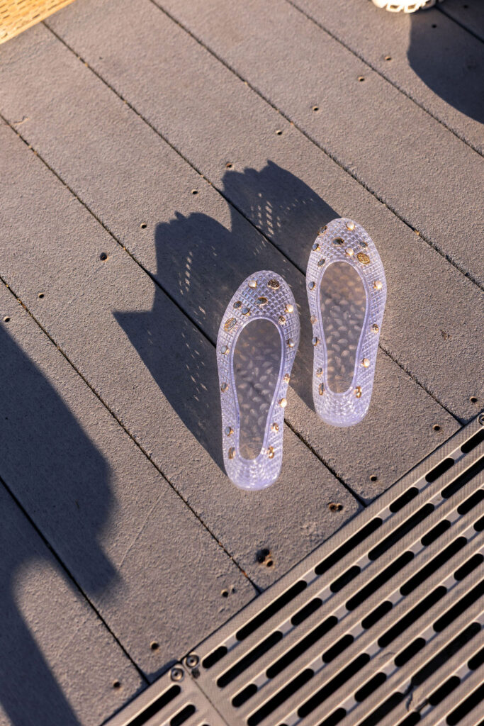 jelly shoes on dock