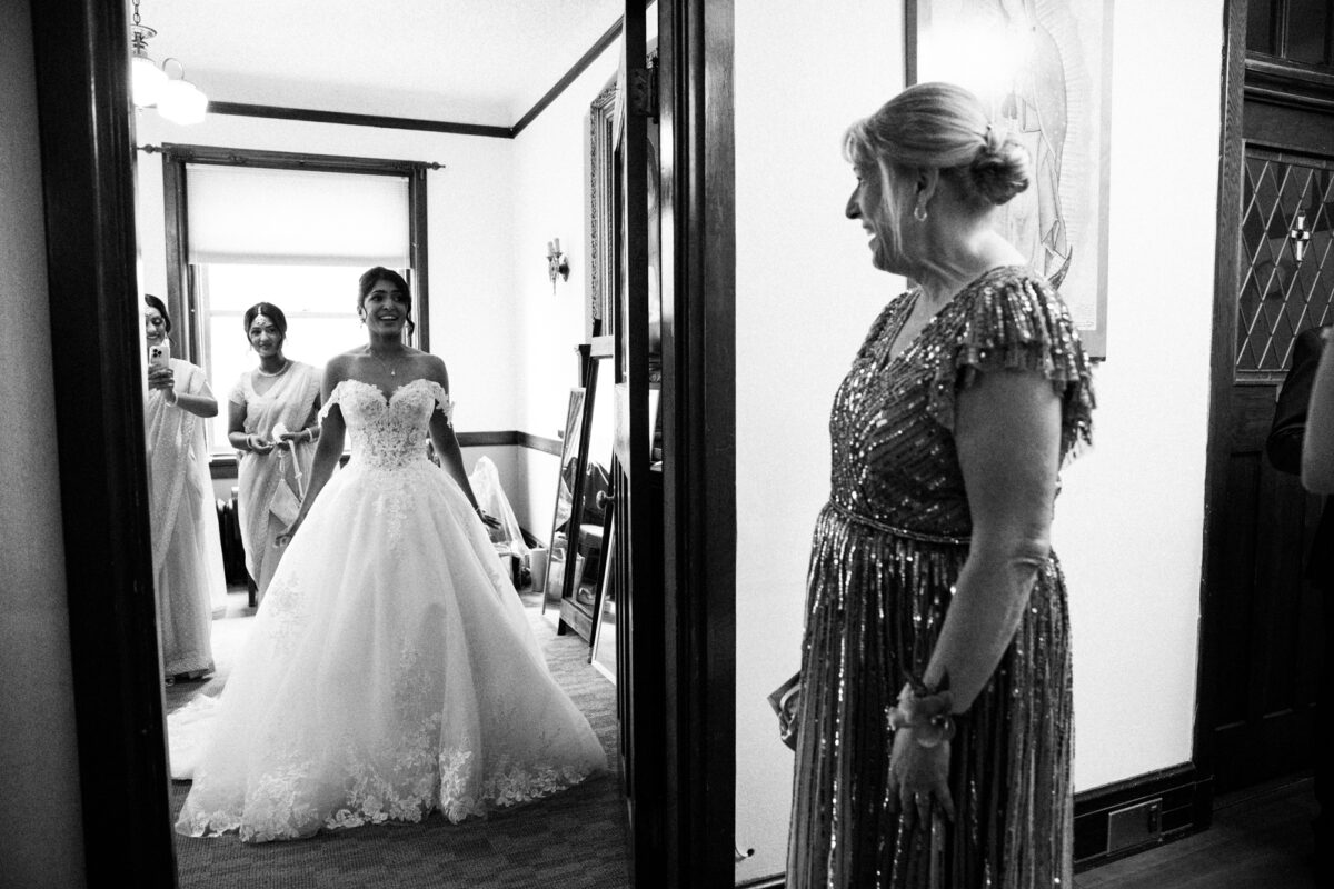 Groom's mom seeing bride before wedding ceremony