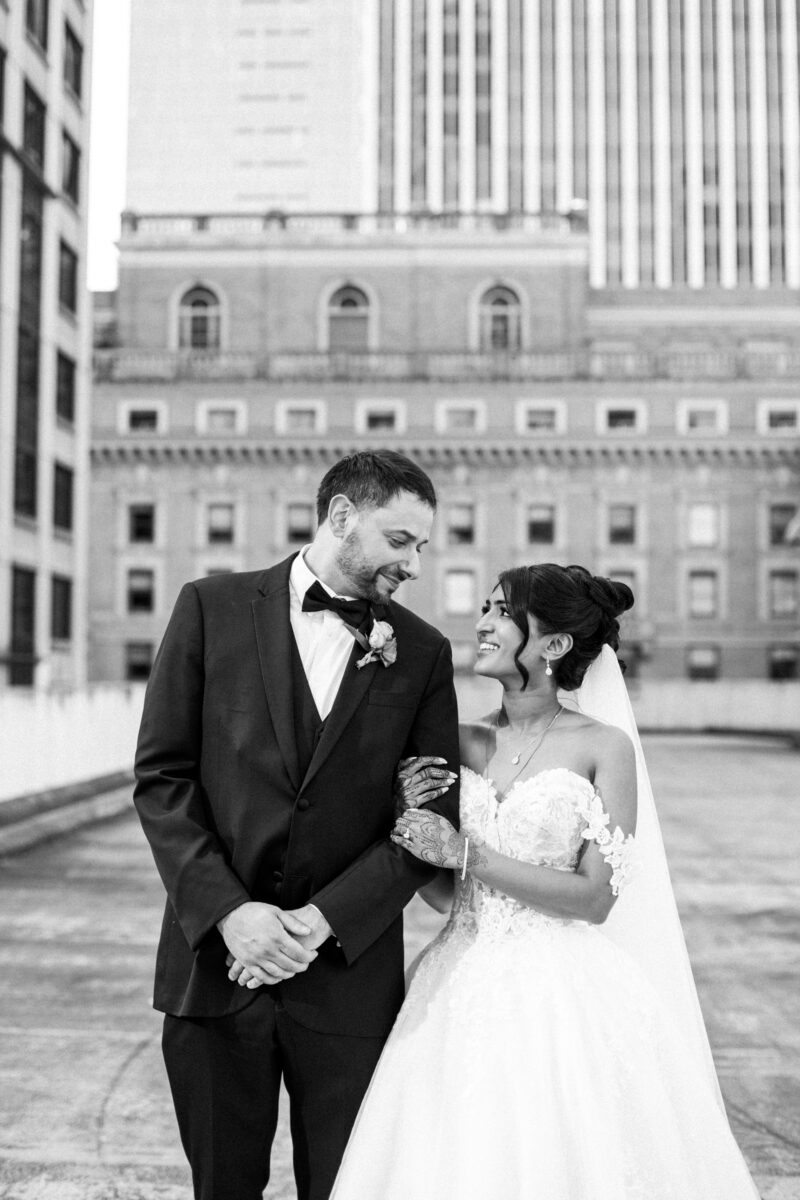 Bride and groom on rooftop in downtown seattle