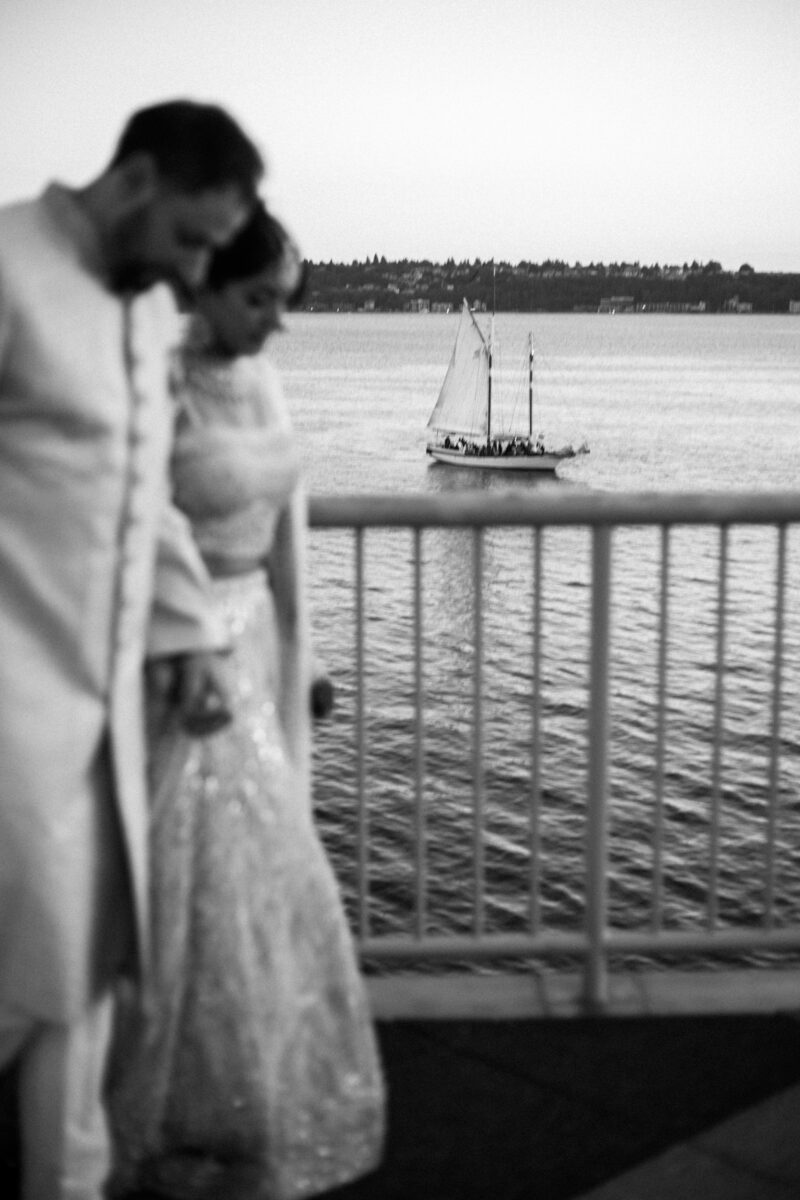 Blue hour, golden hour portraits on top of bell harbor conference center seattle indian wedding