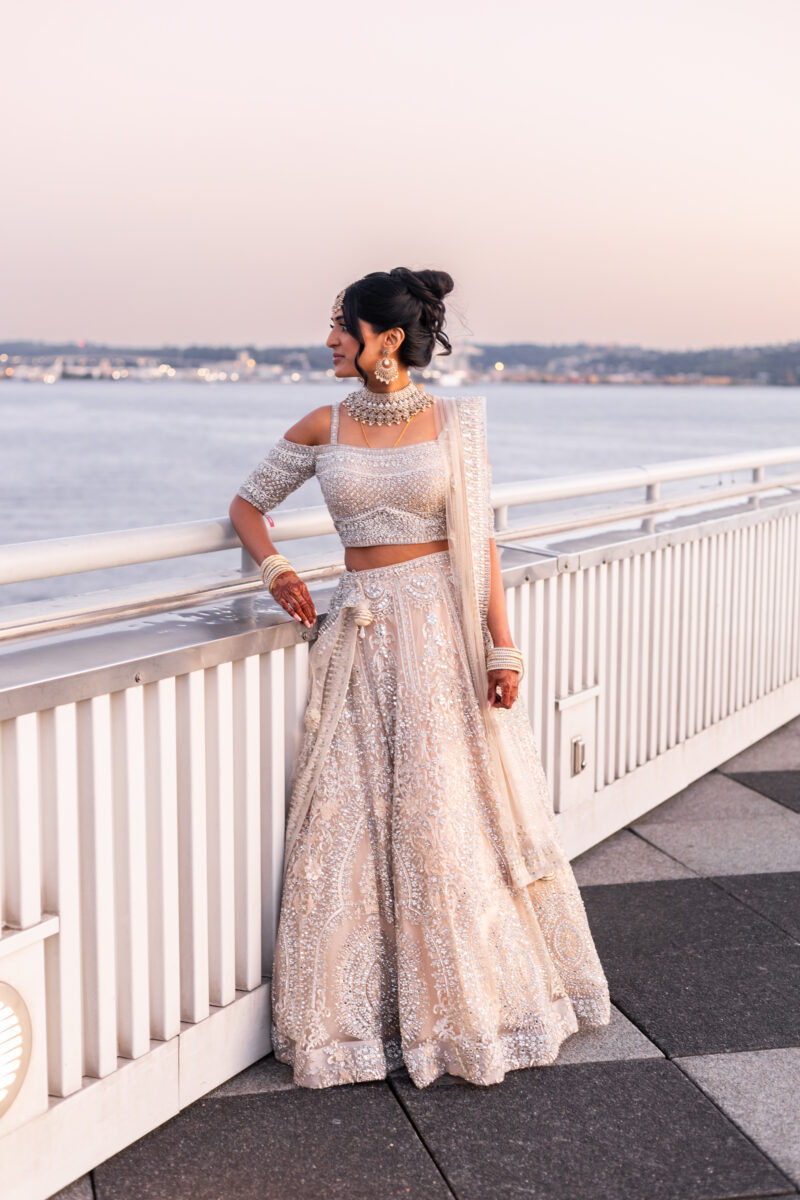 Blue hour, golden hour portraits on top of bell harbor conference center seattle indian wedding