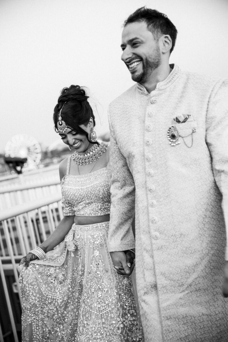 Blue hour, golden hour portraits on top of bell harbor conference center seattle indian wedding