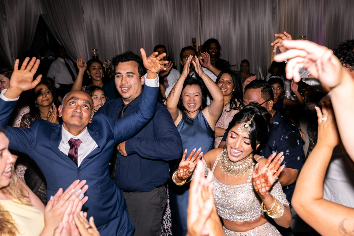 Indian dancing during Seattle Indian wedding downtown.