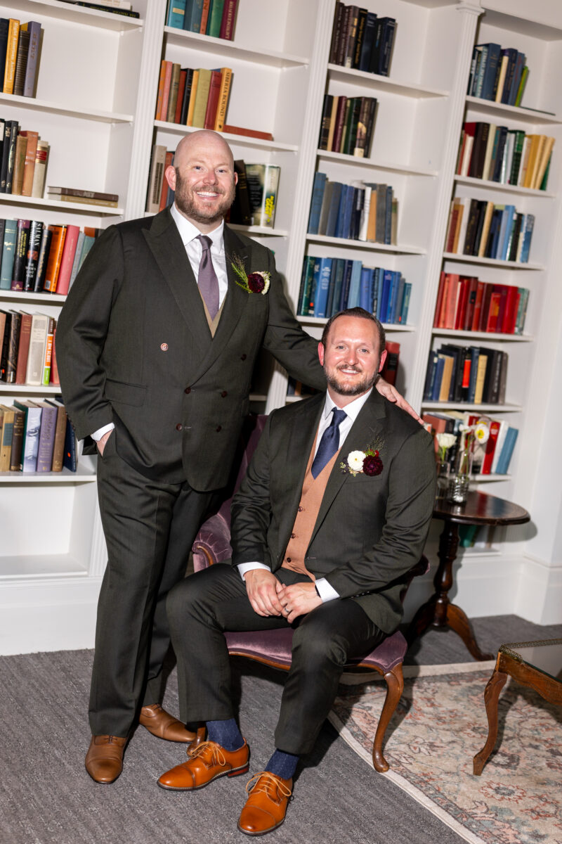 Two grooms in the library of the woodmark hotel