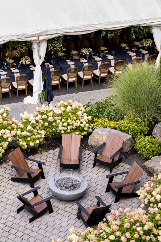 Setting up for Woodmark Hotel wedding with tent
