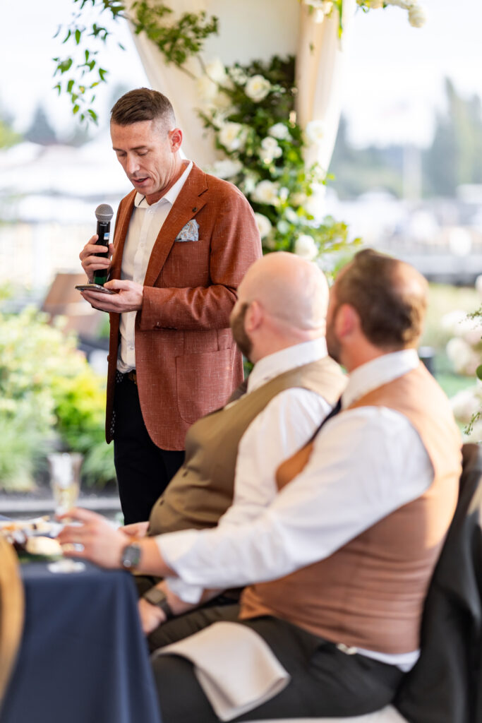 Guests giving wedding speeches