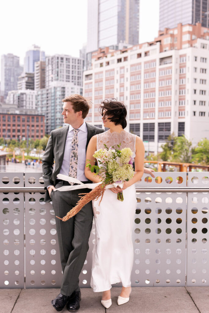 bride and groom on ferry dock