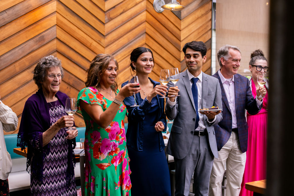 wedding guests cheersing