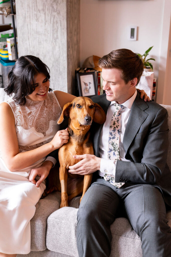 bride and groom with dog