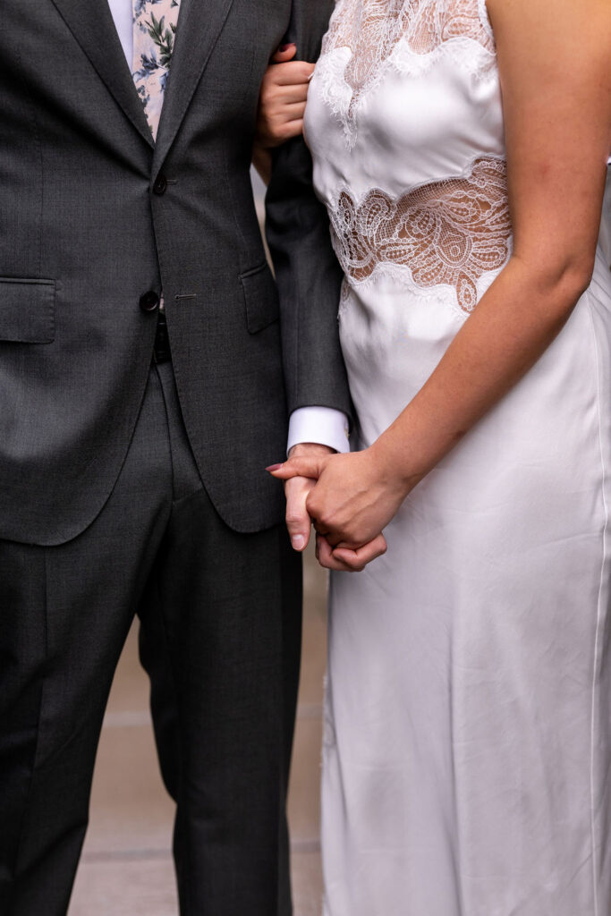 bride and groom snuggling 