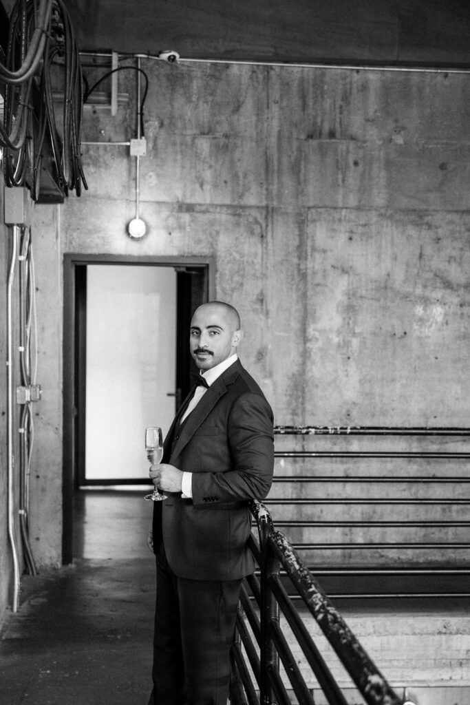 groom standing at railing