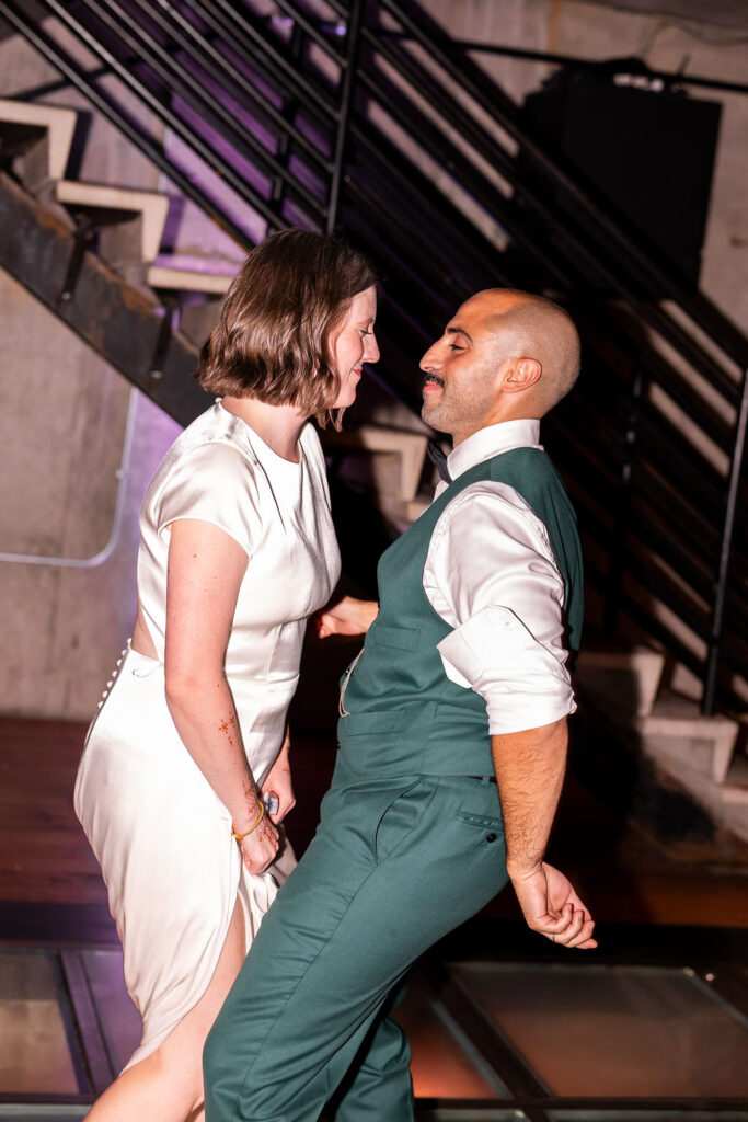 bride and groom dance at wedding