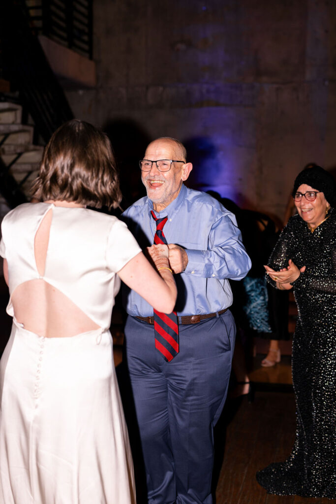 bride and groom dance at wedding