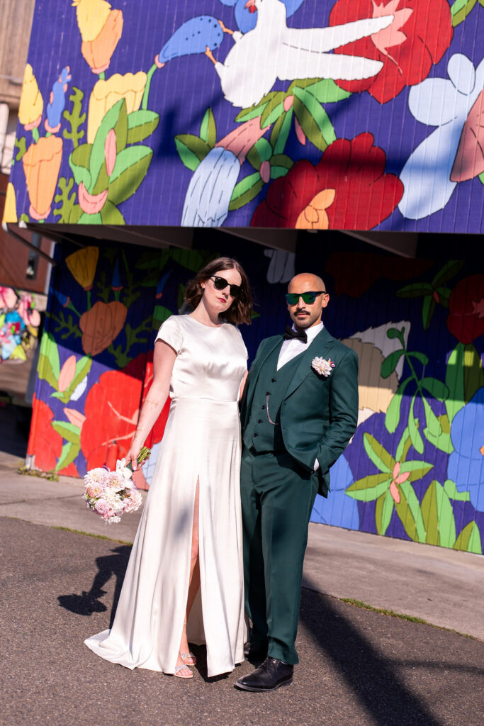 bride and groom pose together