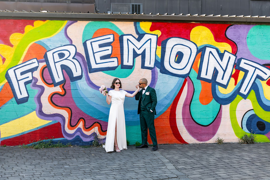 bride and groom pose together